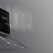 Bild eines Laptops vor grauem Hintergrund, das eine Systemintegration zeigt